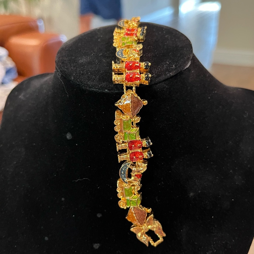 Avon Holiday toys slide charm bracelet New